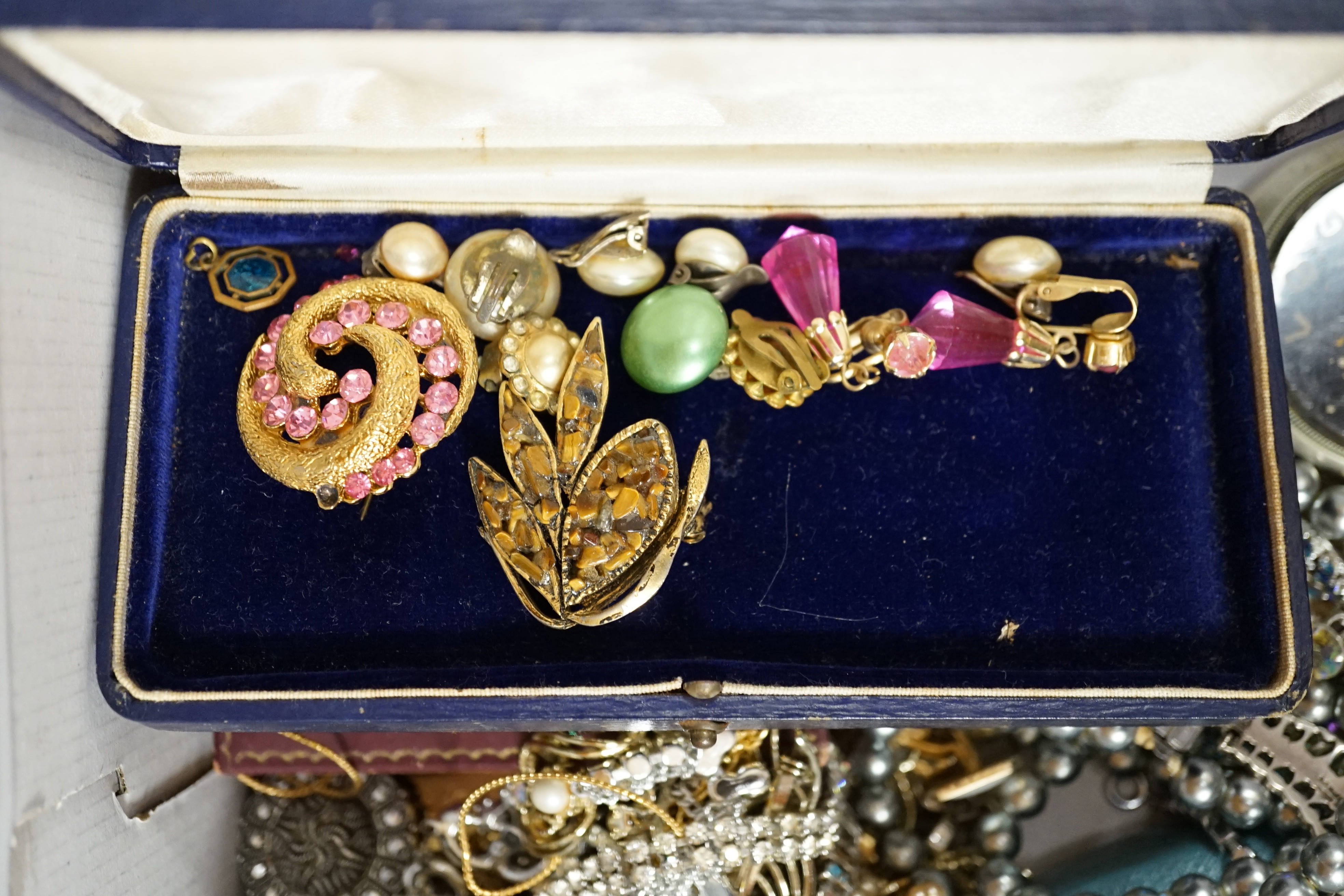 A collection of costume jewellery, some silver to include two 9ct gold cross pendants, marcasite brooches/necklaces and a pair of butterfly wing earrings. Condition - fair